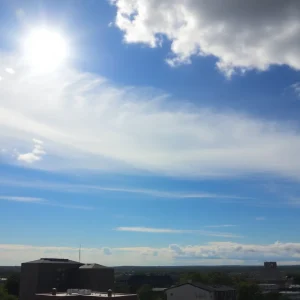 Sunny weather in Providence, Rhode Island with clouds on the horizon