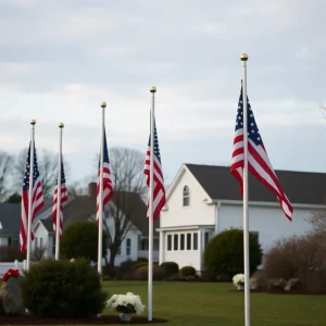 Flags flying at half-staff in a public space in Rhode Island