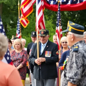 Community ceremony honoring a veteran with American flags