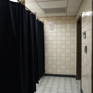 Restroom safety sign at Rhode Island College