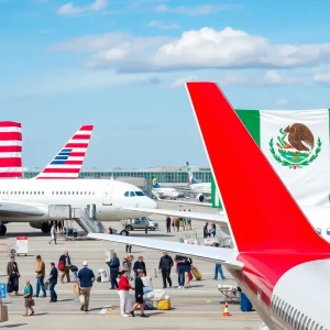 Airport with airplanes and U.S. Mexico flags