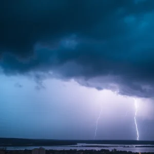 Storm clouds and lightning over Rhode Island indicating extreme weather