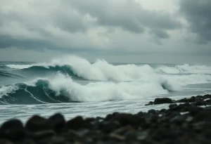 High surf waves crashing on a beach due to Hurricane Humberto
