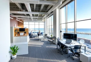Interior of SERHANT. office in Newport, Rhode Island with scenic views