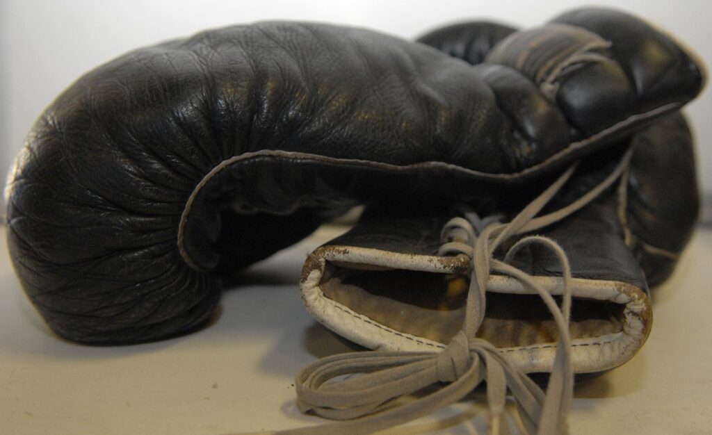Pair of black leather boxing gloves